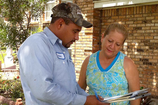 Cytech-and-customer-530×353-1 Cytech showing a woman an estimate
